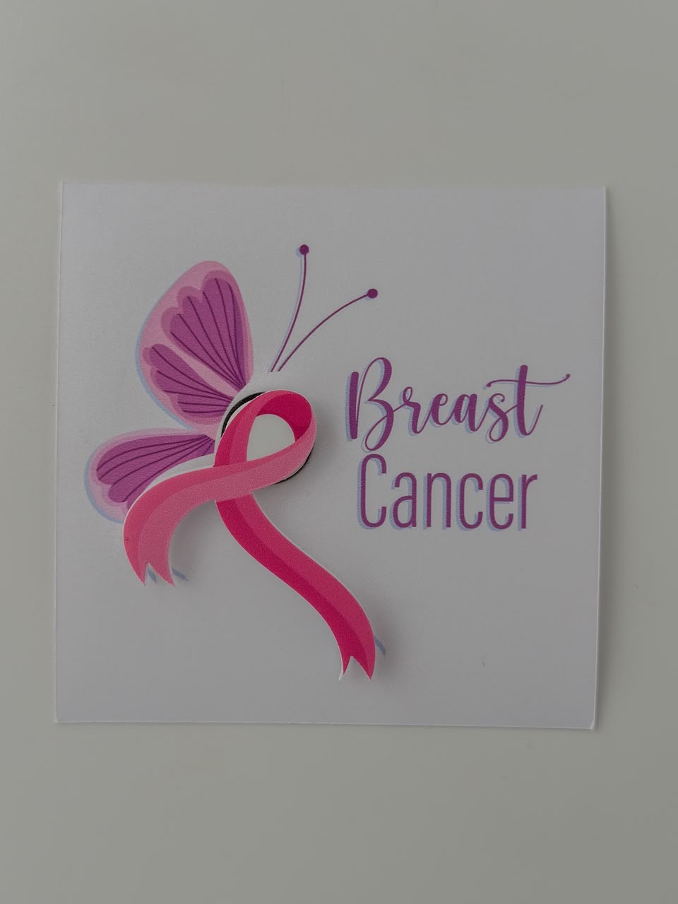 توزيعات كارت توعوي بتصميم الفراشة - (Breast Cancer Awareness)